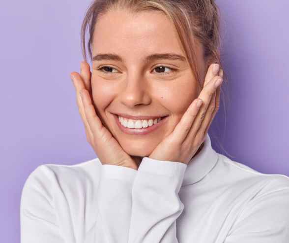 Two women smiling confidently