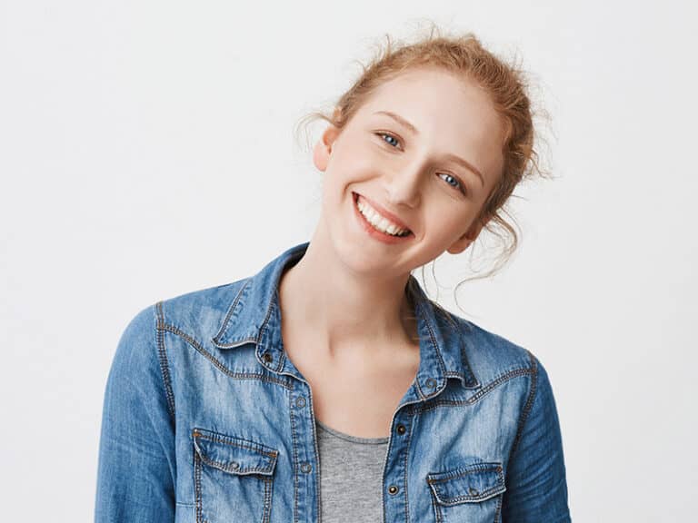 Young woman with white teeth smiling